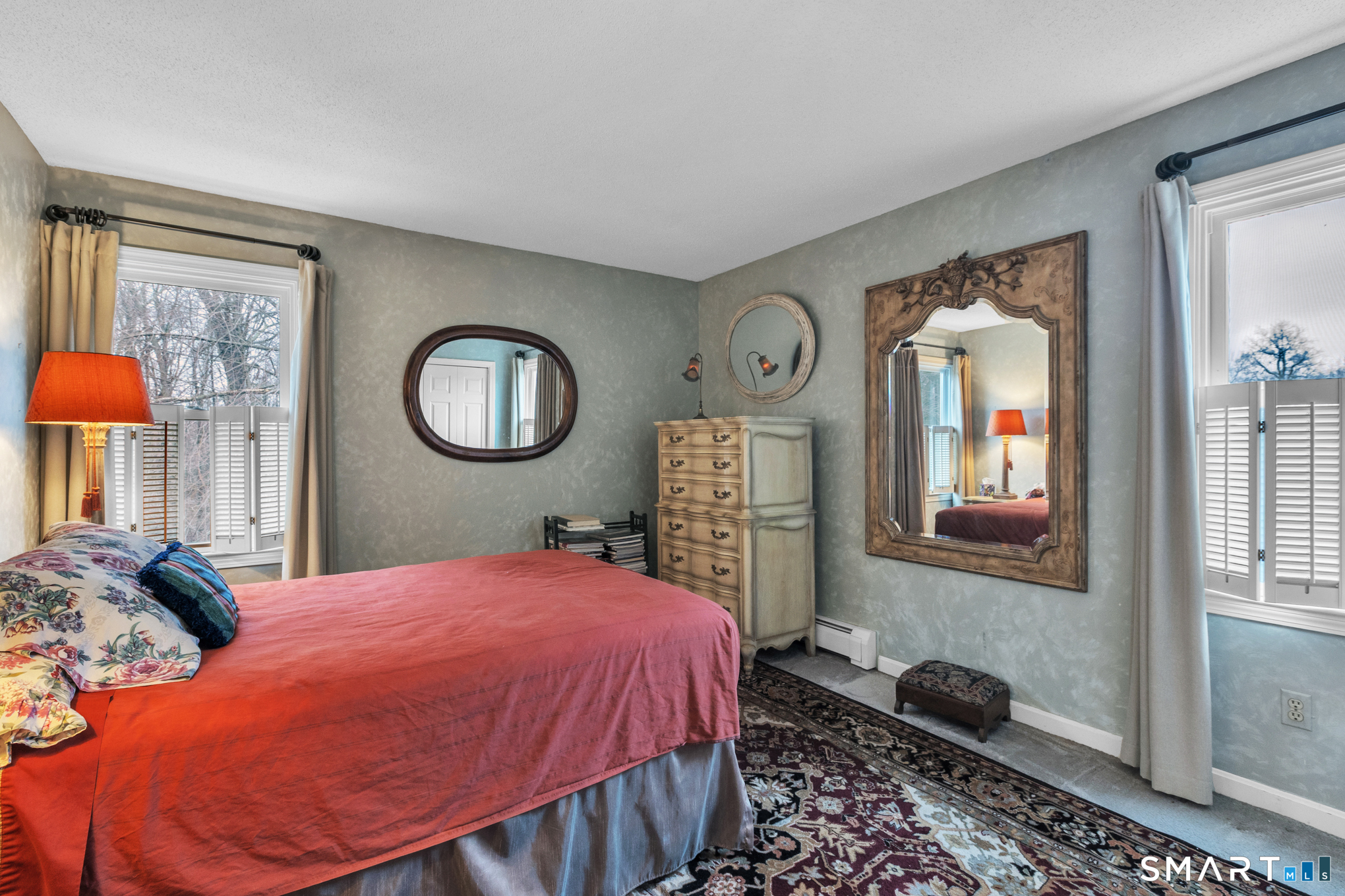 176 Stephen Drive Meriden, CT 06450 - Photo 27 of 34 a bedroom with a bed a mirror and a window