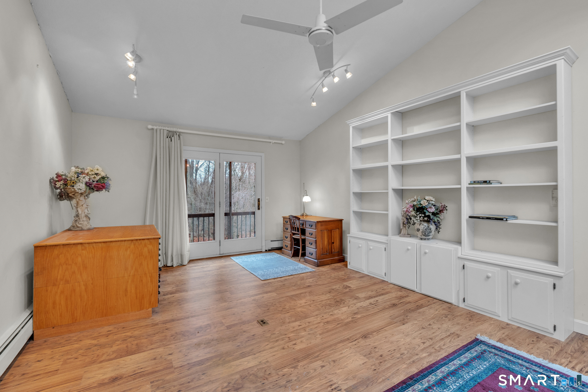 176 Stephen Drive Meriden, CT 06450 - Photo 29 of 34 a room with furniture and wooden floor