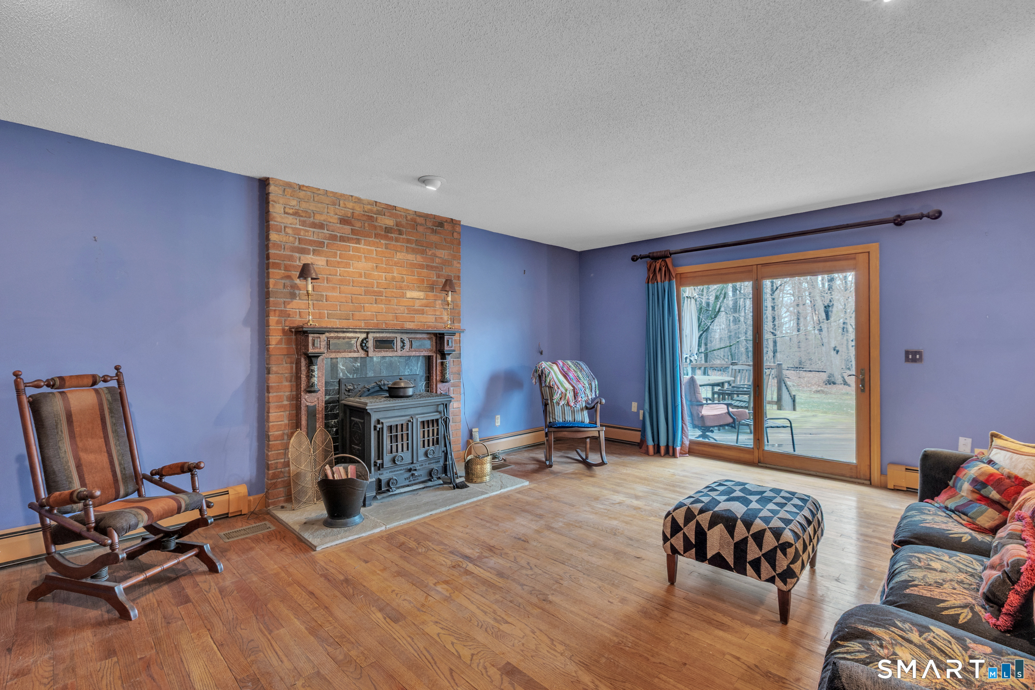 176 Stephen Drive Meriden, CT 06450 - Photo 31 of 34 a living room with furniture and a flat screen tv