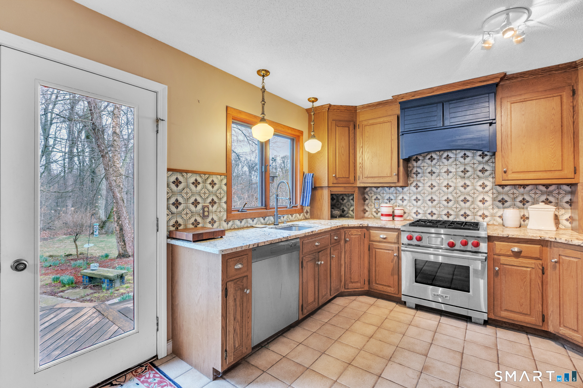 176 Stephen Drive Meriden, CT 06450 - Photo 34 of 34 a kitchen with stainless steel appliances granite countertop a stove and a sink