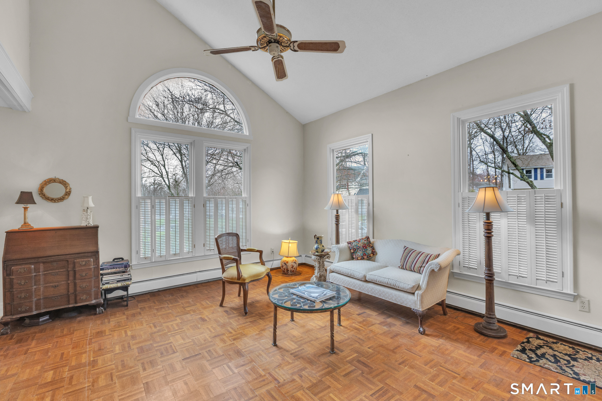 176 Stephen Drive Meriden, CT 06450 - Photo 8 of 34 a living room with furniture a fireplace and a chandelier