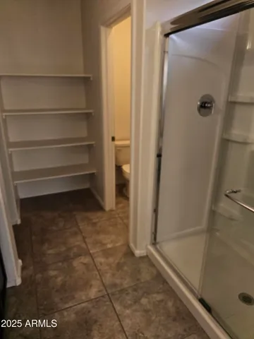 a view of room with a walk in closet