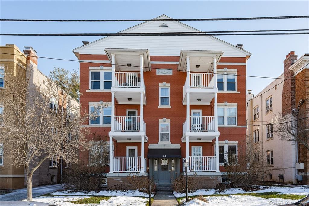 26 Robin Road, Unit 5 West Hartford, CT 06119 - Photo 1 of 1 a front view of a building with street view