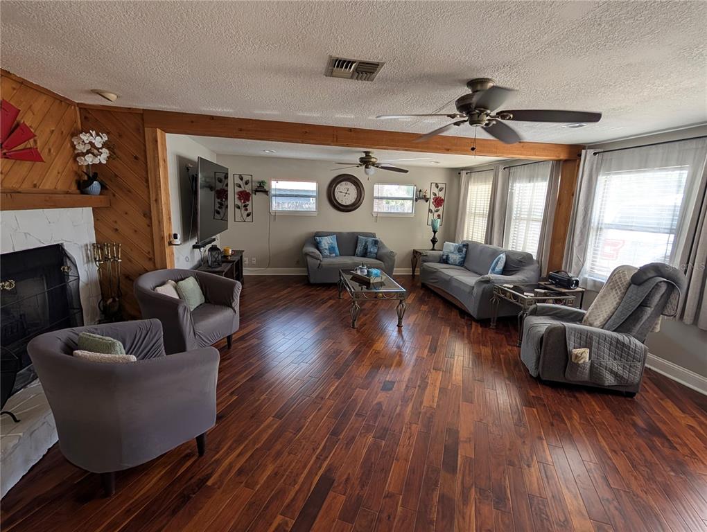 5508 Bryson Drive Orlando, FL 32818 - Photo 14 of 69 a living room with furniture and a large window