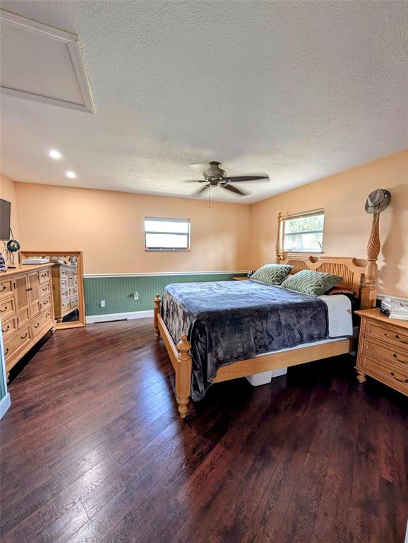 5508 Bryson Drive Orlando, FL 32818 - Photo 39 of 69 a bedroom with a bed and window