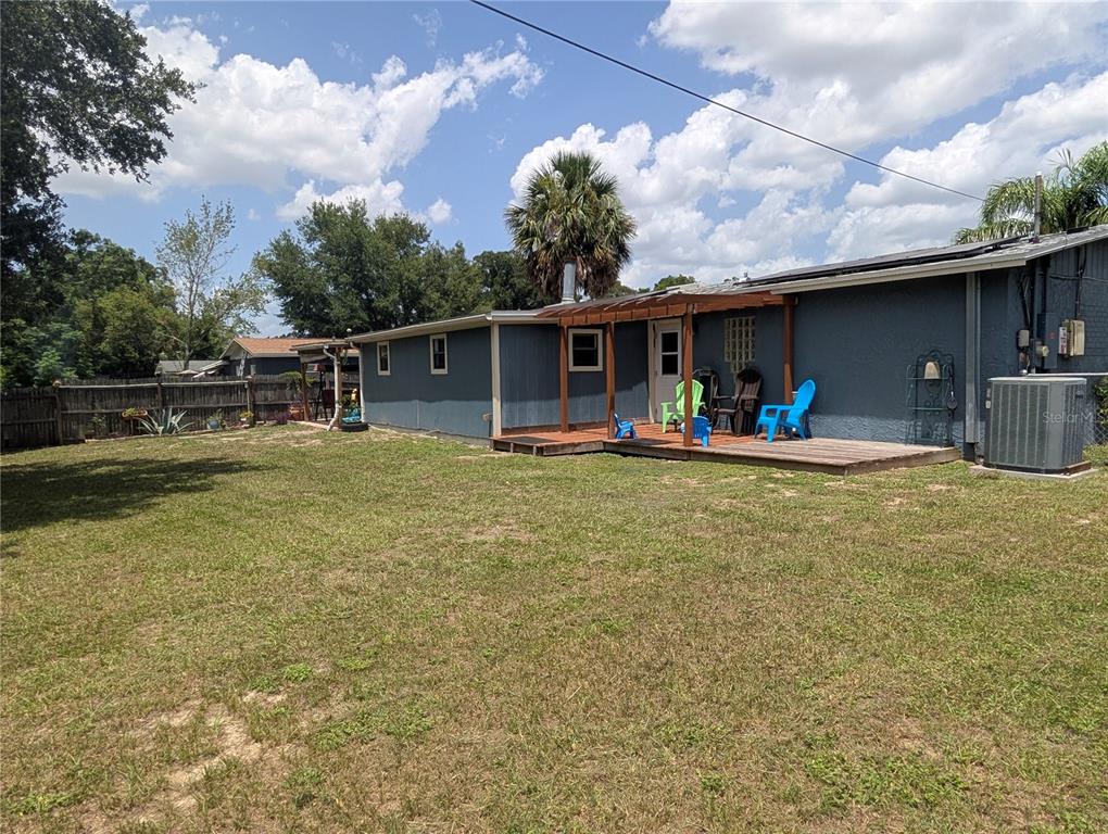 5508 Bryson Drive Orlando, FL 32818 - Photo 62 of 69 a view of a house with backyard and swimming pool