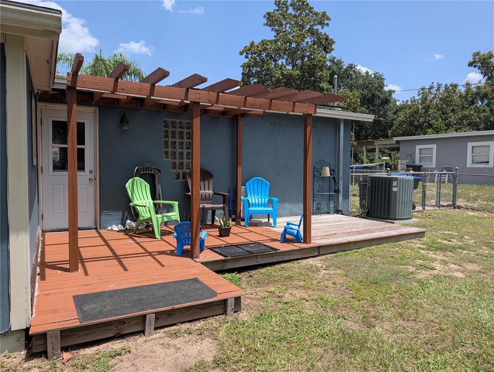 5508 Bryson Drive Orlando, FL 32818 - Photo 68 of 69 a front view of house with yard outdoor seating and barbeque oven