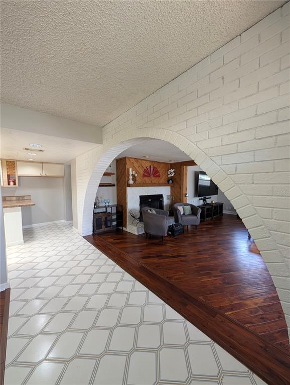 5508 Bryson Drive Orlando, FL 32818 - Photo 10 of 69 a room with lots of furniture and wooden floor