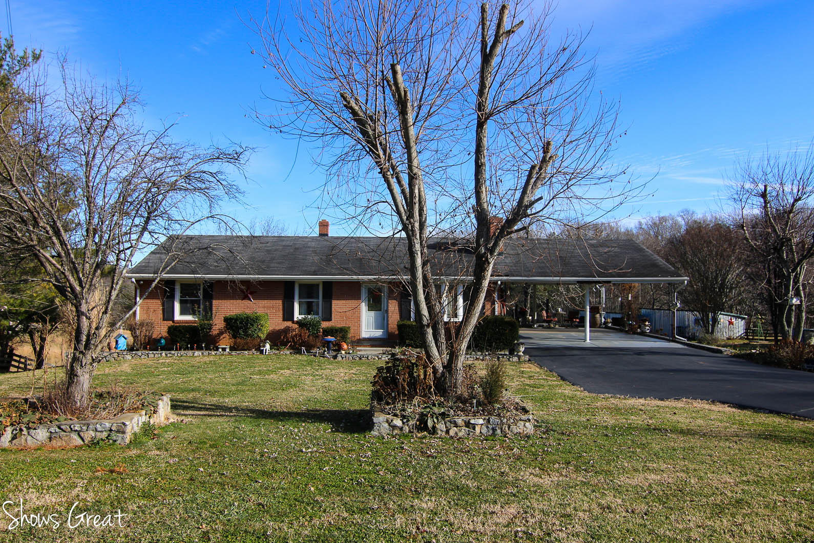 2880 Morgans Mill Road Goodview, VA 24095 - Photo 1 of 34 a front view of house with yard and green space