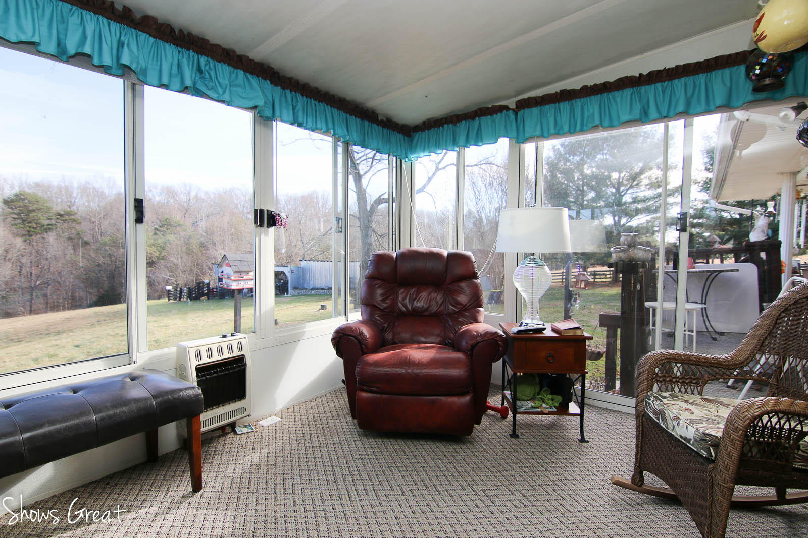 2880 Morgans Mill Road Goodview, VA 24095 - Photo 12 of 34 a living room with furniture and a floor to ceiling window