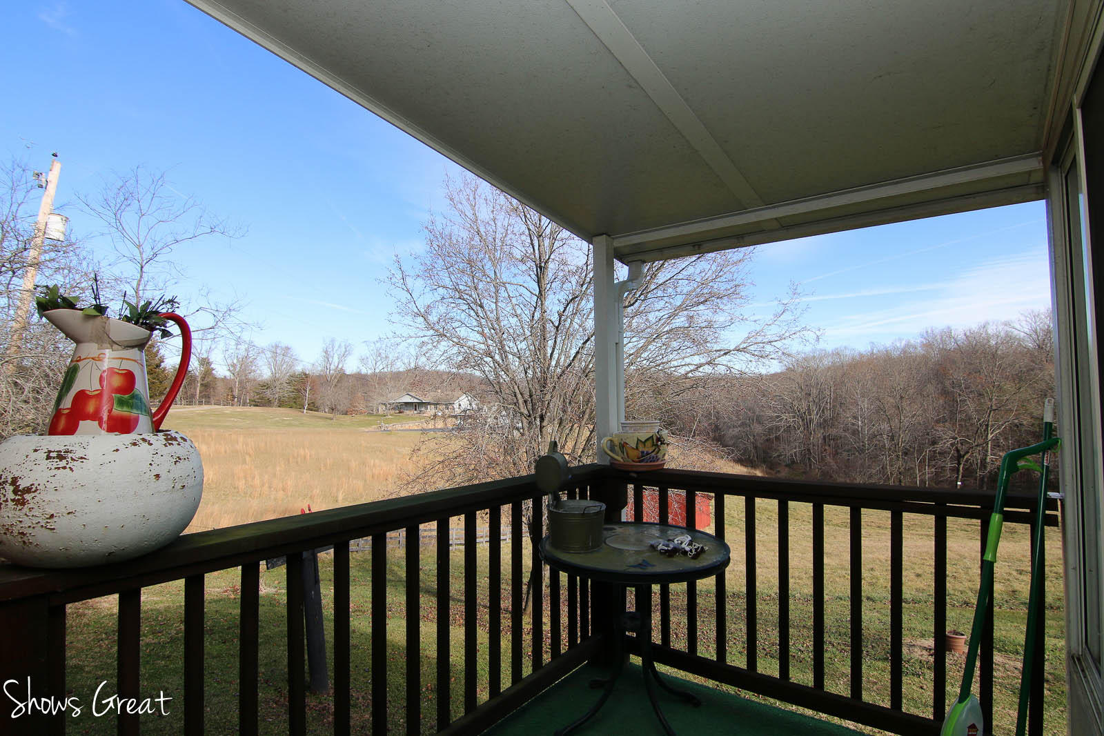 2880 Morgans Mill Road Goodview, VA 24095 - Photo 13 of 34 a balcony with wooden floor and outdoor space