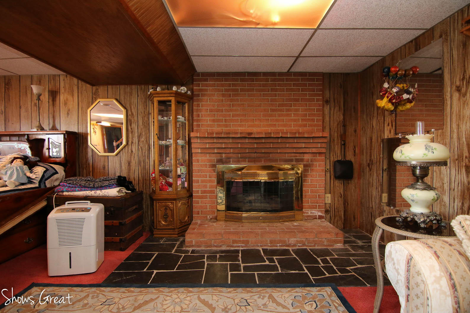2880 Morgans Mill Road Goodview, VA 24095 - Photo 25 of 34 a room with furniture a flat screen tv and a fireplace