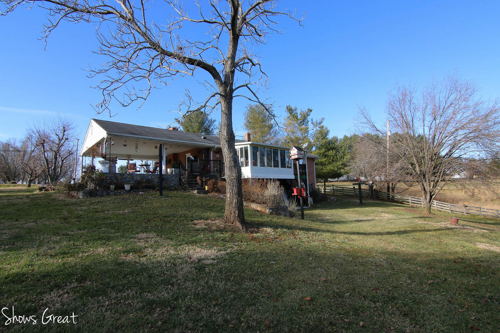 2880 Morgans Mill Road Goodview, VA 24095 - Photo 28 of 34 a view of a house with a yard