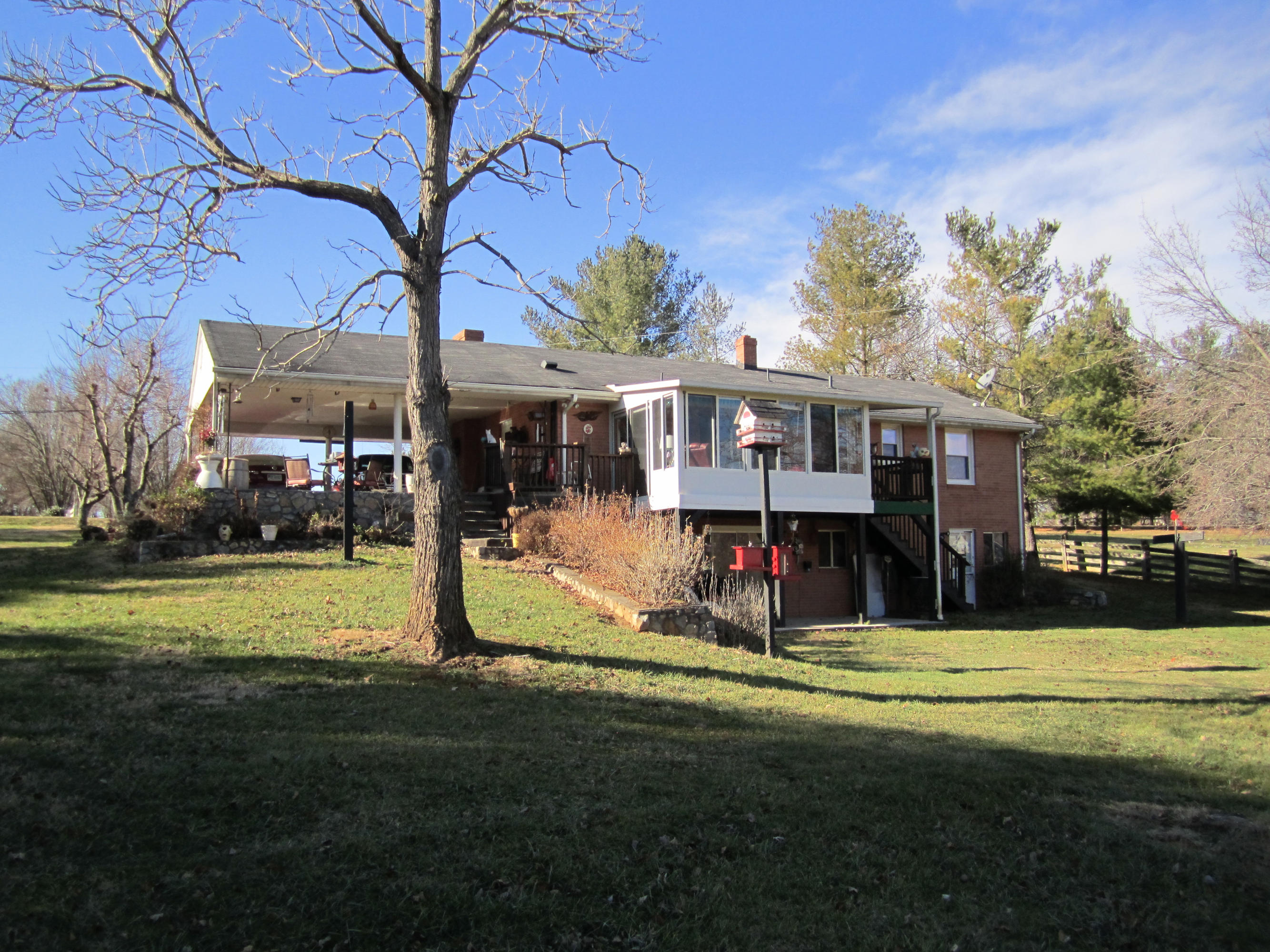 2880 Morgans Mill Road Goodview, VA 24095 - Photo 4 of 34 a view of a house with a yard