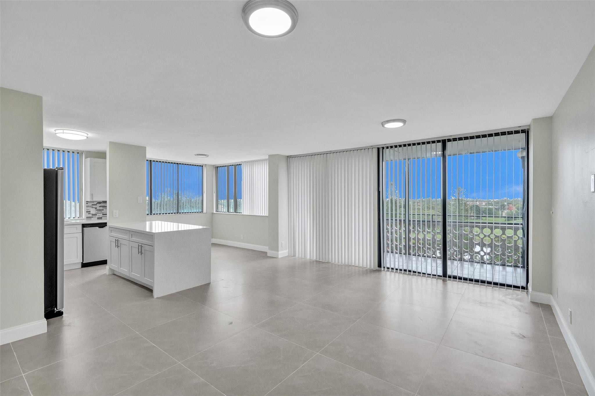4222 Inverrary Boulevard, Unit 4810 Lauderhill, FL 33319 - Photo 12 of 63 a view of a kitchen with a sink and cabinets