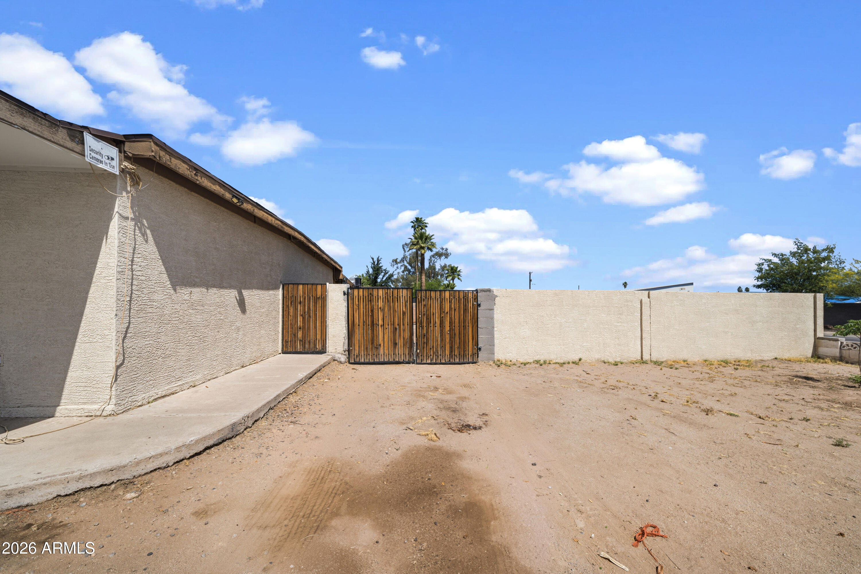 3902 West Monte Vista Road Phoenix, AZ 85009 - Photo 20 of 29 a view of a house with a snow in front of yard