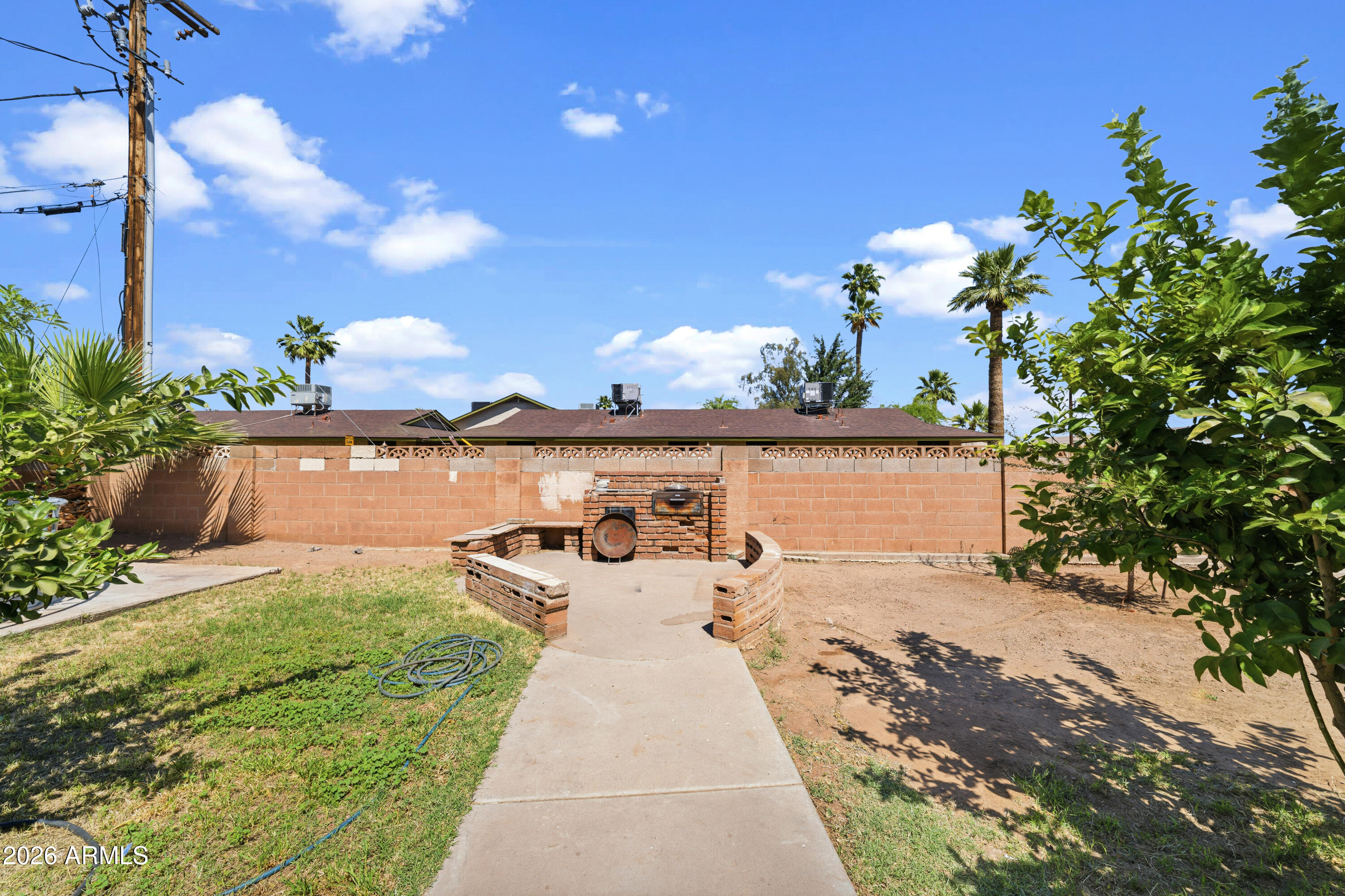 3902 West Monte Vista Road Phoenix, AZ 85009 - Photo 23 of 29 a view of a backyard with sitting area