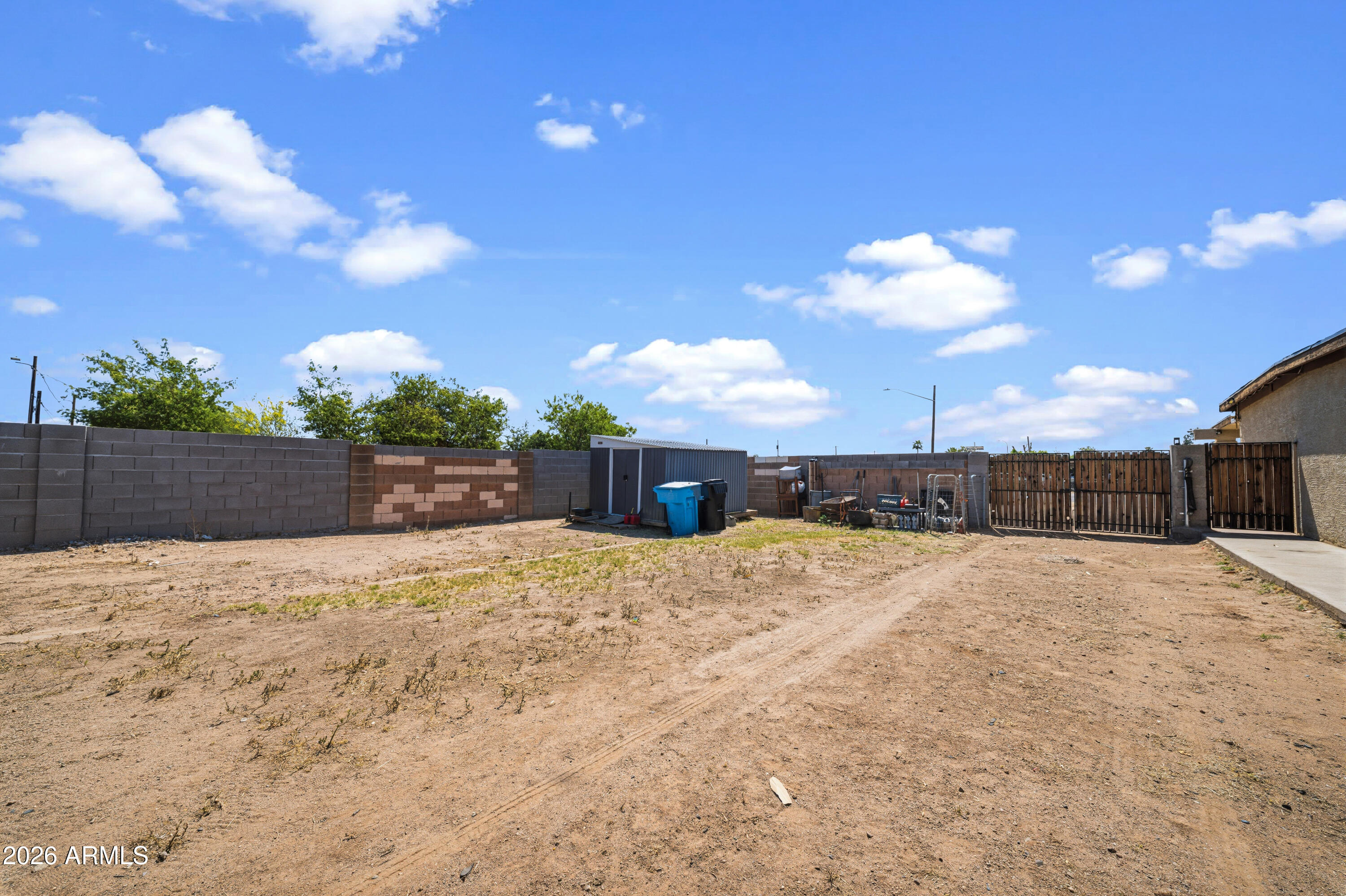 3902 West Monte Vista Road Phoenix, AZ 85009 - Photo 24 of 29 a patio with a yard