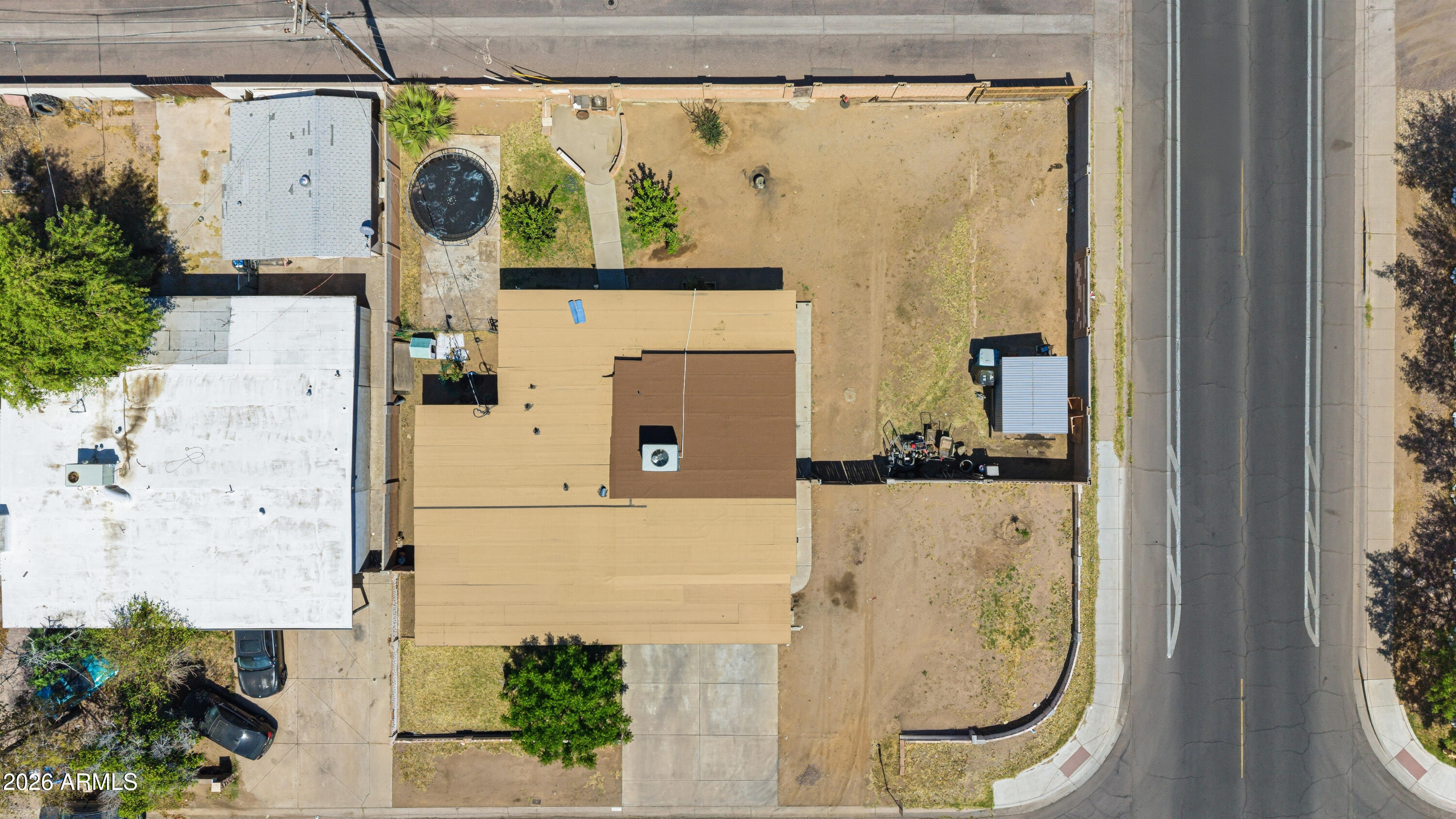 3902 West Monte Vista Road Phoenix, AZ 85009 - Photo 25 of 29 a view of a bathroom with a shower and a mirror