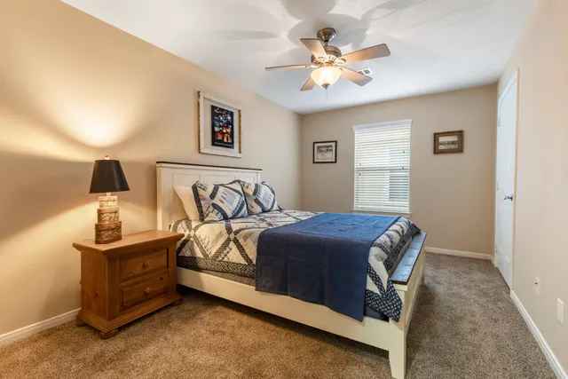 a view of a hallway with a white walls