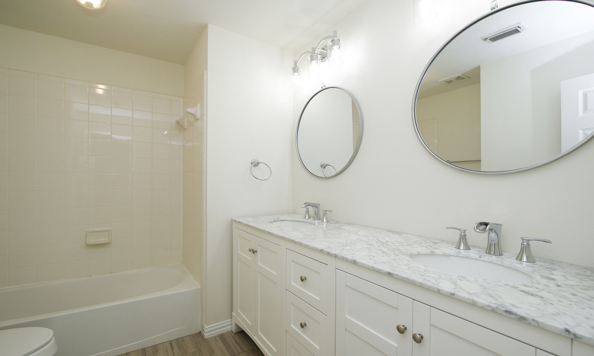 1210 Berwick Manor Court Spring, TX 77379 - Photo 41 of 50 a bathroom with a granite countertop sink mirror and bathtub