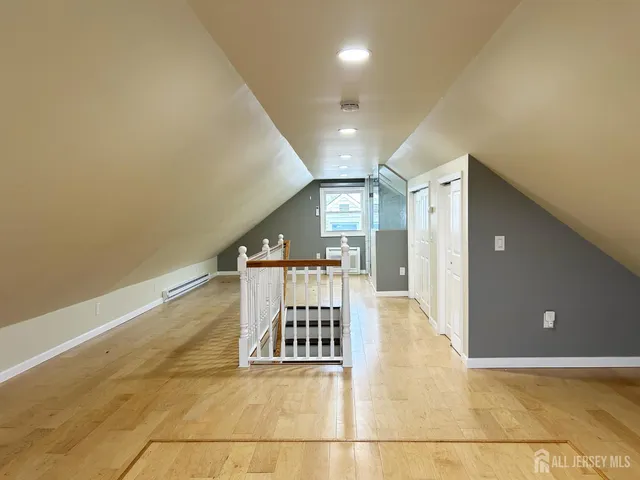 a view of a hallway with a large window