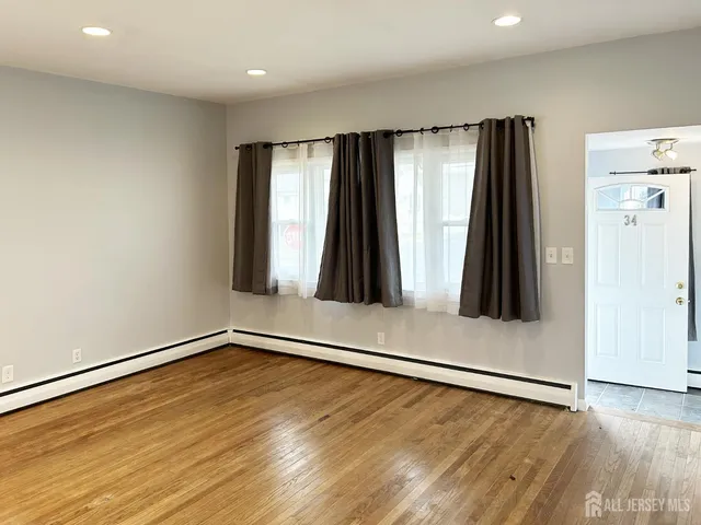 wooden floor with an empty room