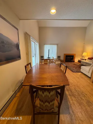 a room with furniture and wooden floor