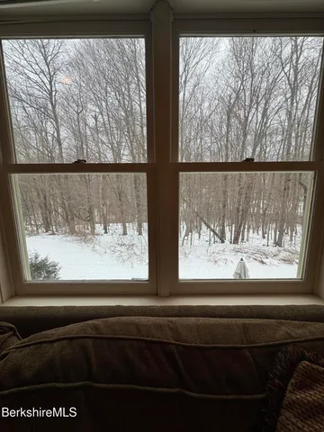 a view of a chairs and table in the terrace