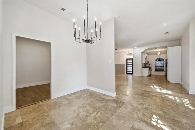 a view of a kitchen and a window