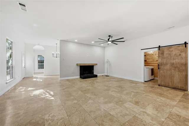 a view of a livingroom with a fireplace