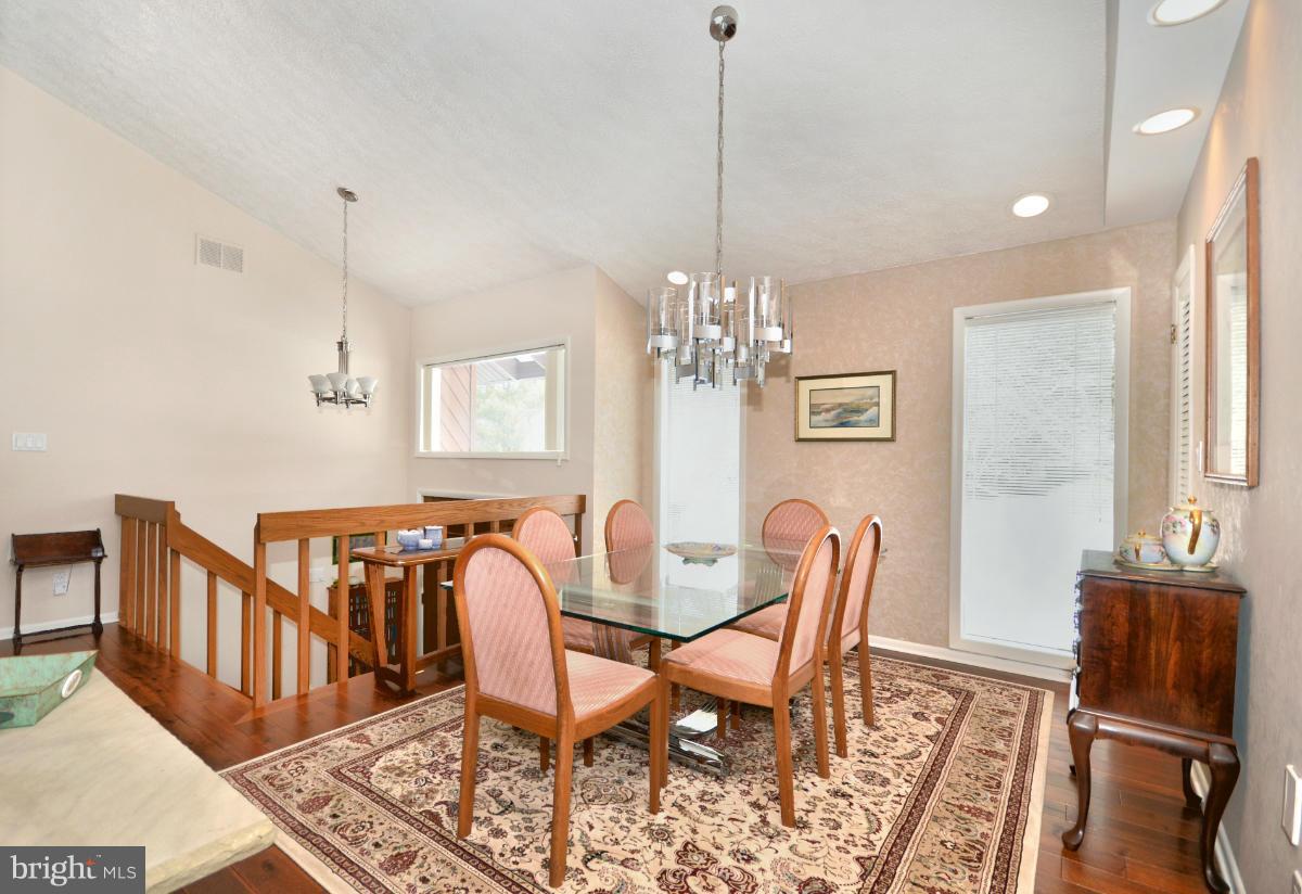 13912 Glen High Road Baldwin, MD 21013 - Photo 3 of 28 a view of a dining room with furniture window and wooden floor