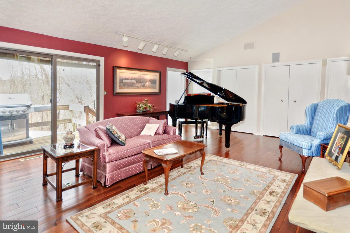13912 Glen High Road Baldwin, MD 21013 - Photo 6 of 28 a living room with furniture and a wooden floor
