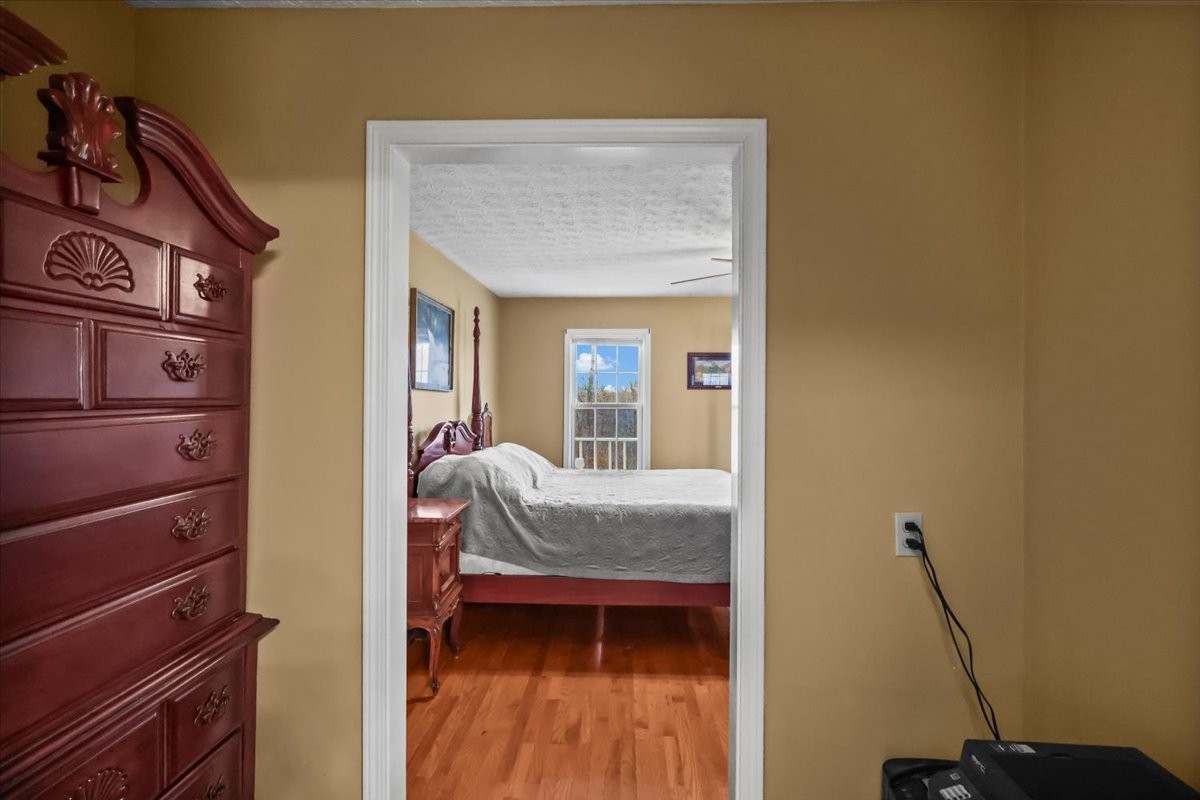 2981 Rocky Hill Road Smiths Grove, KY 42171 - Photo 18 of 31 a view of living room with furniture and wooden floor