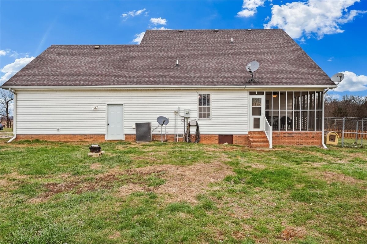 2981 Rocky Hill Road Smiths Grove, KY 42171 - Photo 27 of 31 a view of a house with backyard and garden
