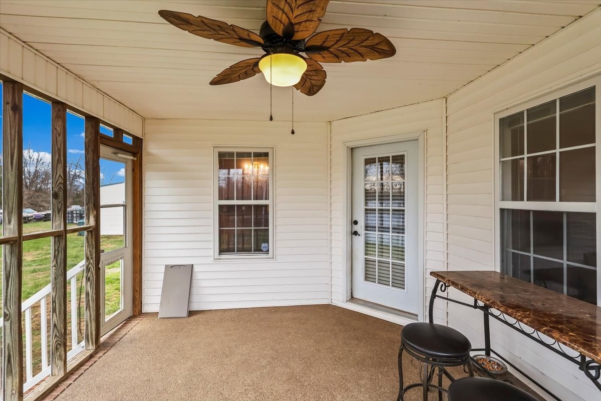 2981 Rocky Hill Road Smiths Grove, KY 42171 - Photo 28 of 31 a bedroom with furniture window and ceiling fan