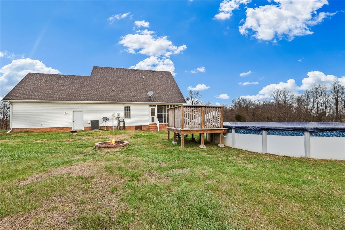 2981 Rocky Hill Road Smiths Grove, KY 42171 - Photo 29 of 31 a view of a house with a swimming pool