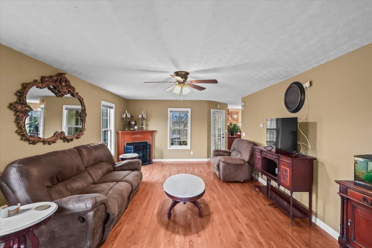 2981 Rocky Hill Road Smiths Grove, KY 42171 - Photo 4 of 31 a living room with furniture and a fireplace