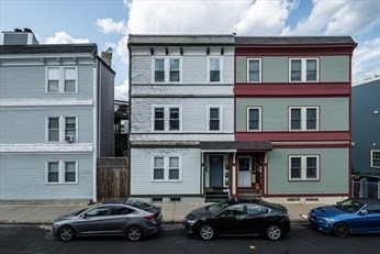 84 Emerson Street, Unit 2 Boston, MA 02127 - Photo 17 of 18 a car parked in front of a building