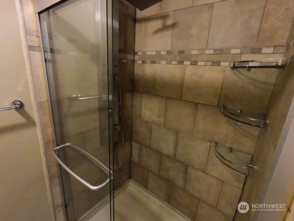 422 South 26th Street Renton, WA 98055 - Photo 13 of 24 a bathroom with a shower