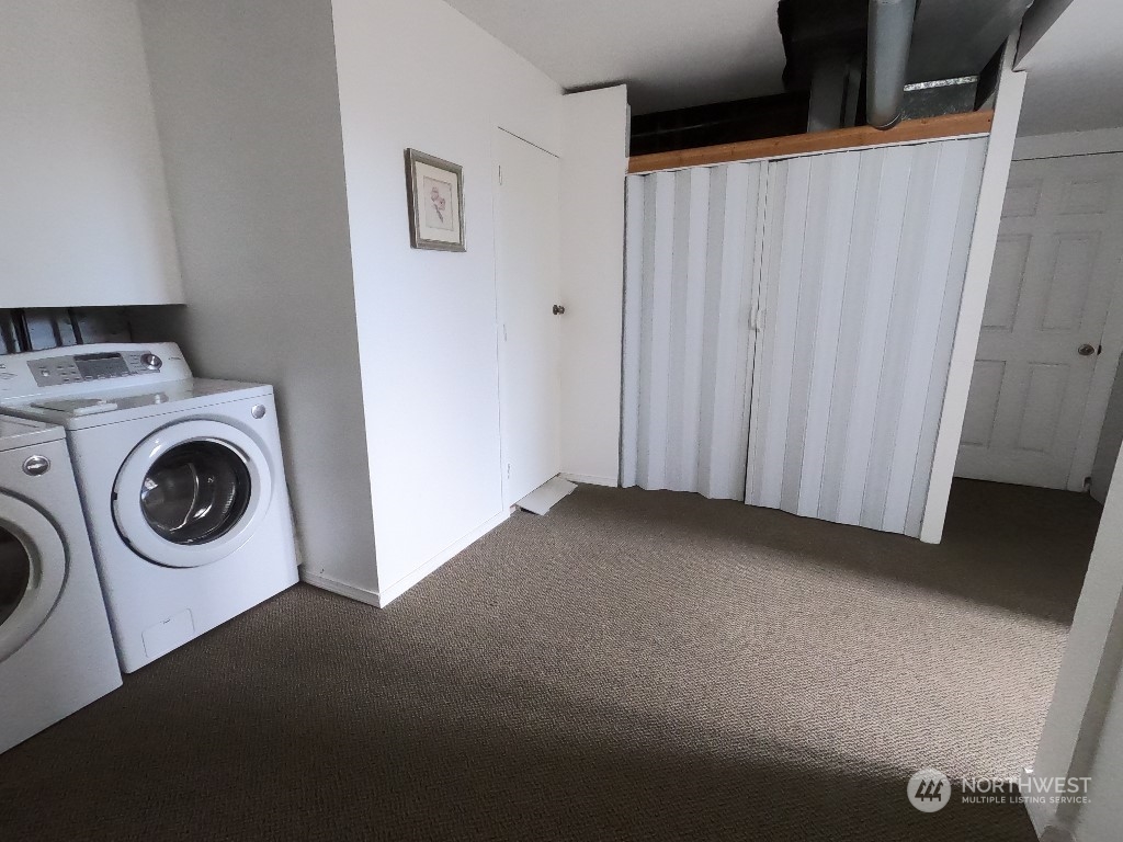 422 South 26th Street Renton, WA 98055 - Photo 21 of 24 a view of a storage & utility room with washer and dryer