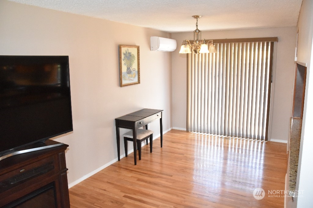 422 South 26th Street Renton, WA 98055 - Photo 6 of 24 a view of a livingroom with furniture and wooden floor