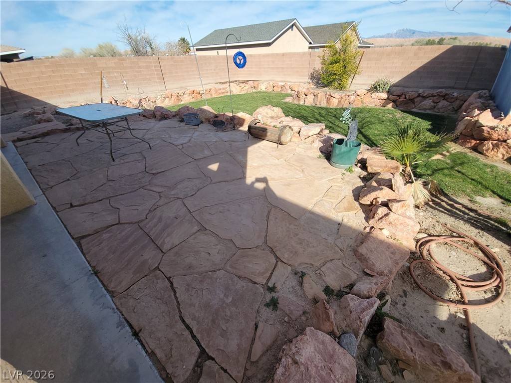 768 Weiser Ridge Street Overton, NV 89040 - Photo 27 of 37 Fenced backyard featuring a patio