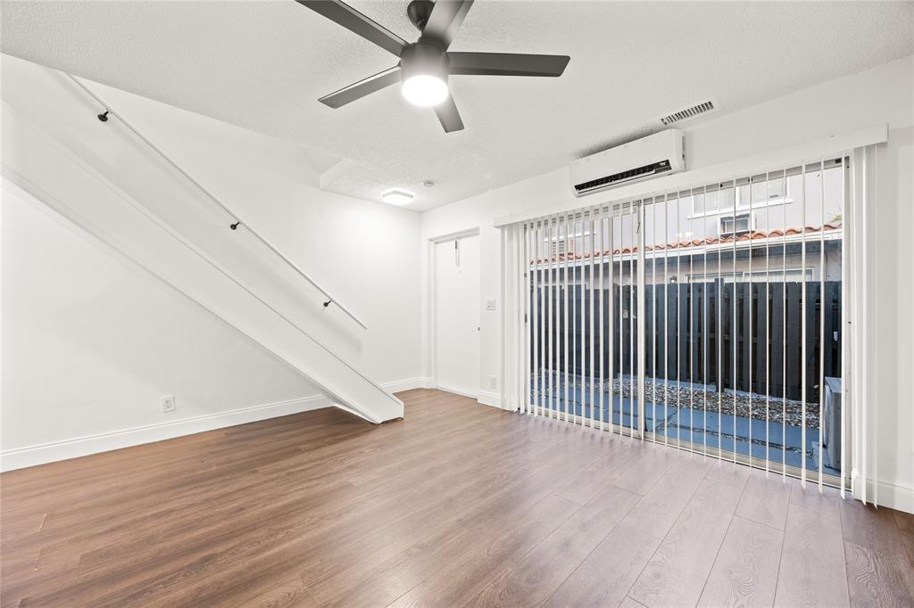 1801 Northeast 56th Street, Unit 5 Fort Lauderdale, FL 33308 - Photo 2 of 22 a view of entryway with wooden floor