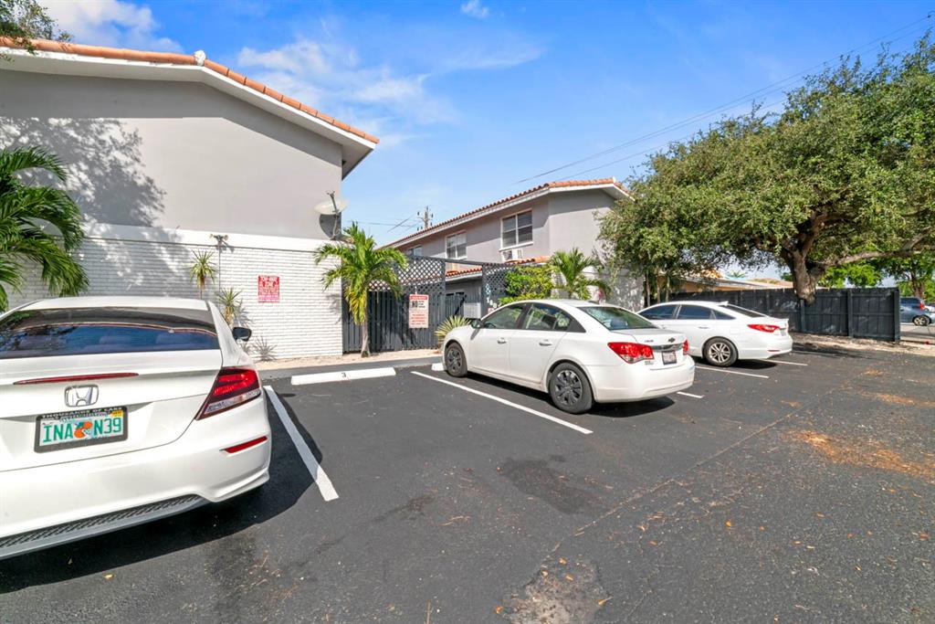 1801 Northeast 56th Street, Unit 5 Fort Lauderdale, FL 33308 - Photo 22 of 22 a view of parking area