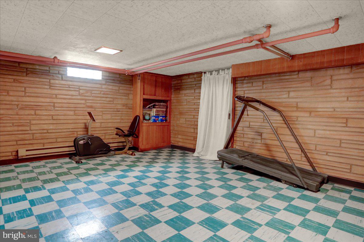 509 March Street Reading, PA 19607 - Photo 21 of 25 Finished lower level to make your own.