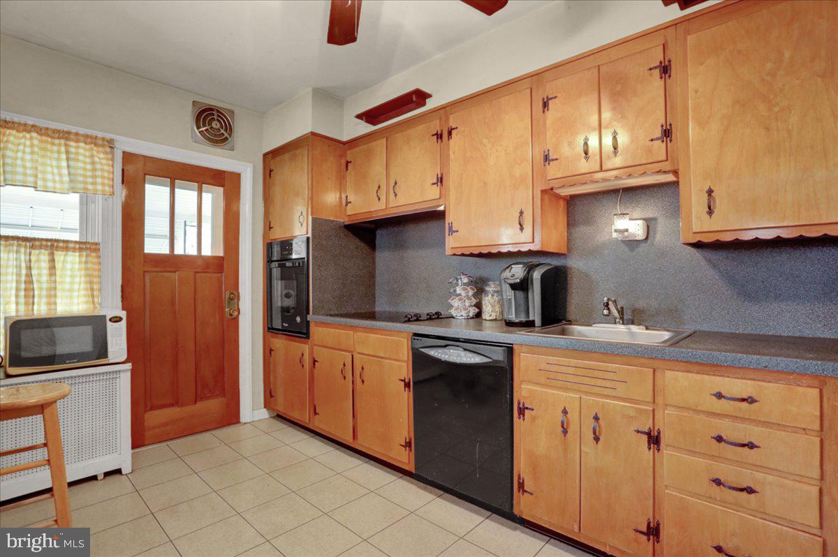509 March Street Reading, PA 19607 - Photo 9 of 25 Kitchen leads to rear patio