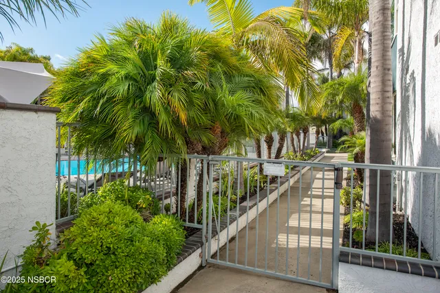 a view of balcony with small garden