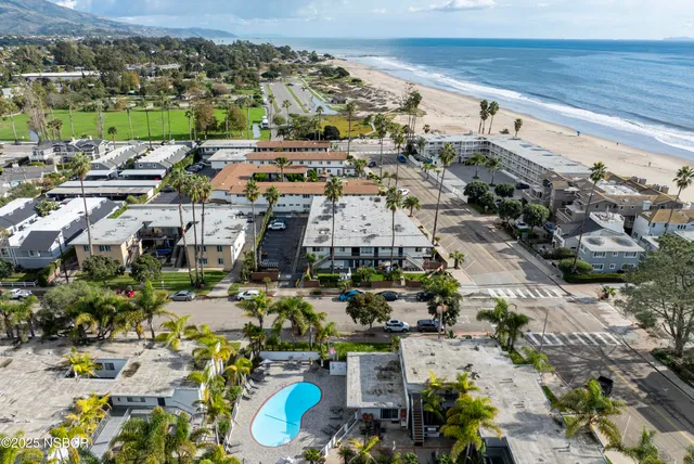 an aerial view of a building with outdoor space
