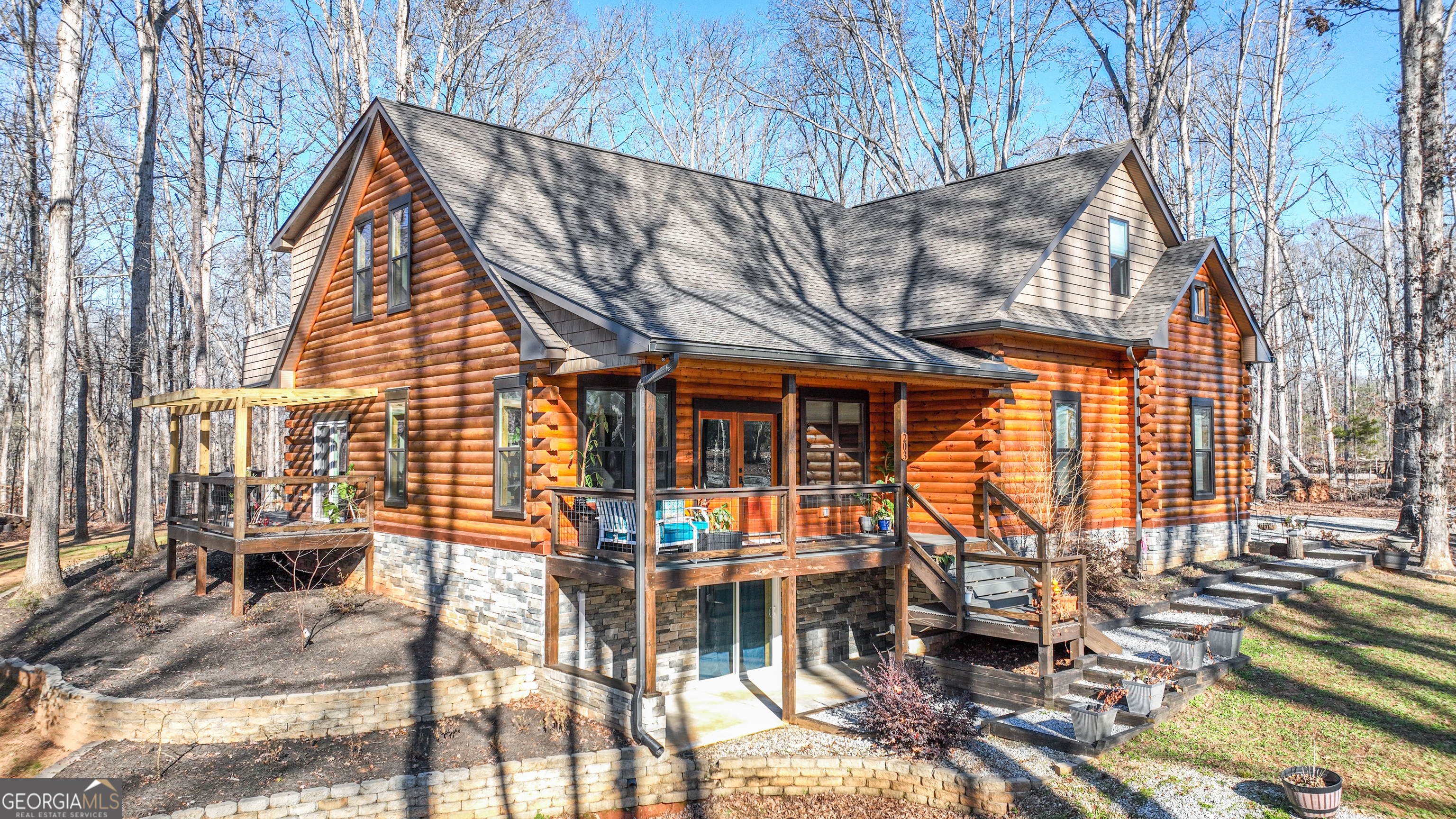 203 Teasley Lane Hartwell, GA 30643 - Photo 2 of 32 a view of house with a yard